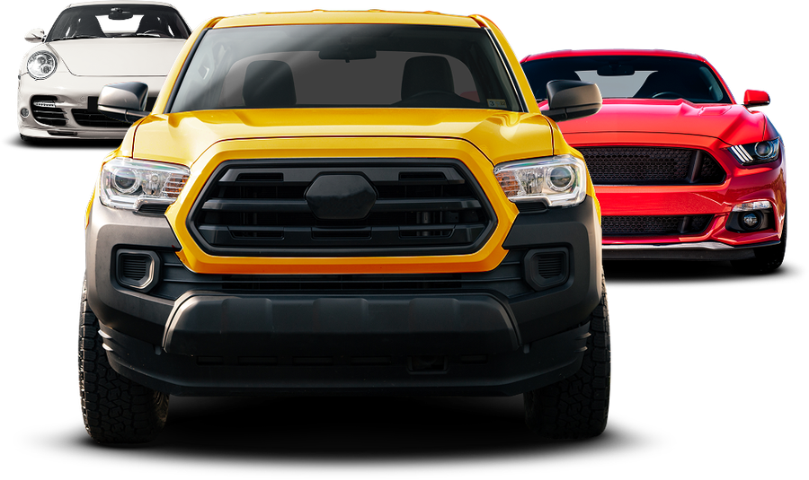 Three sports cars on white background: yellow truck front and center, red car and white car behind. | Suburban Wrench