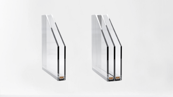 Three pieces of glass are sitting next to each other on a white surface.