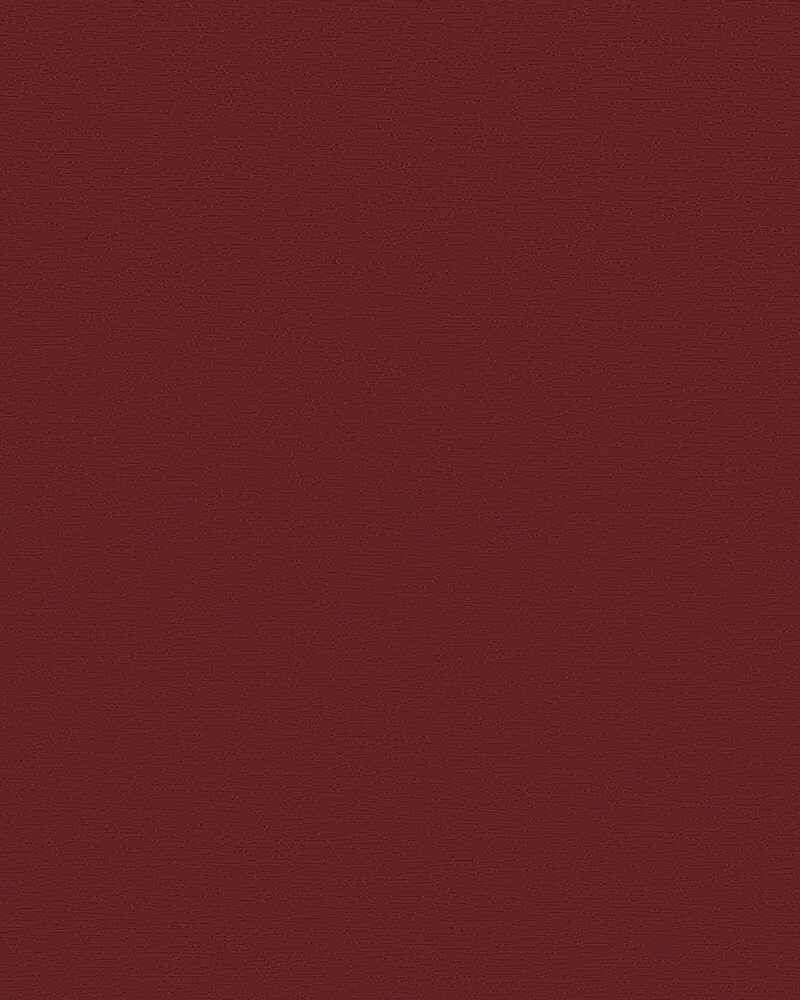 A close up of a red paper texture.