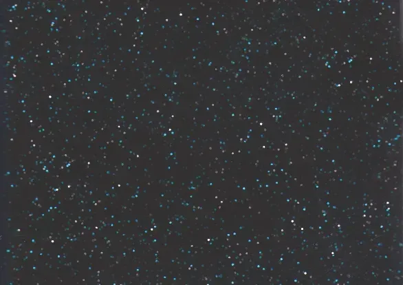 A black background with blue glitter on it