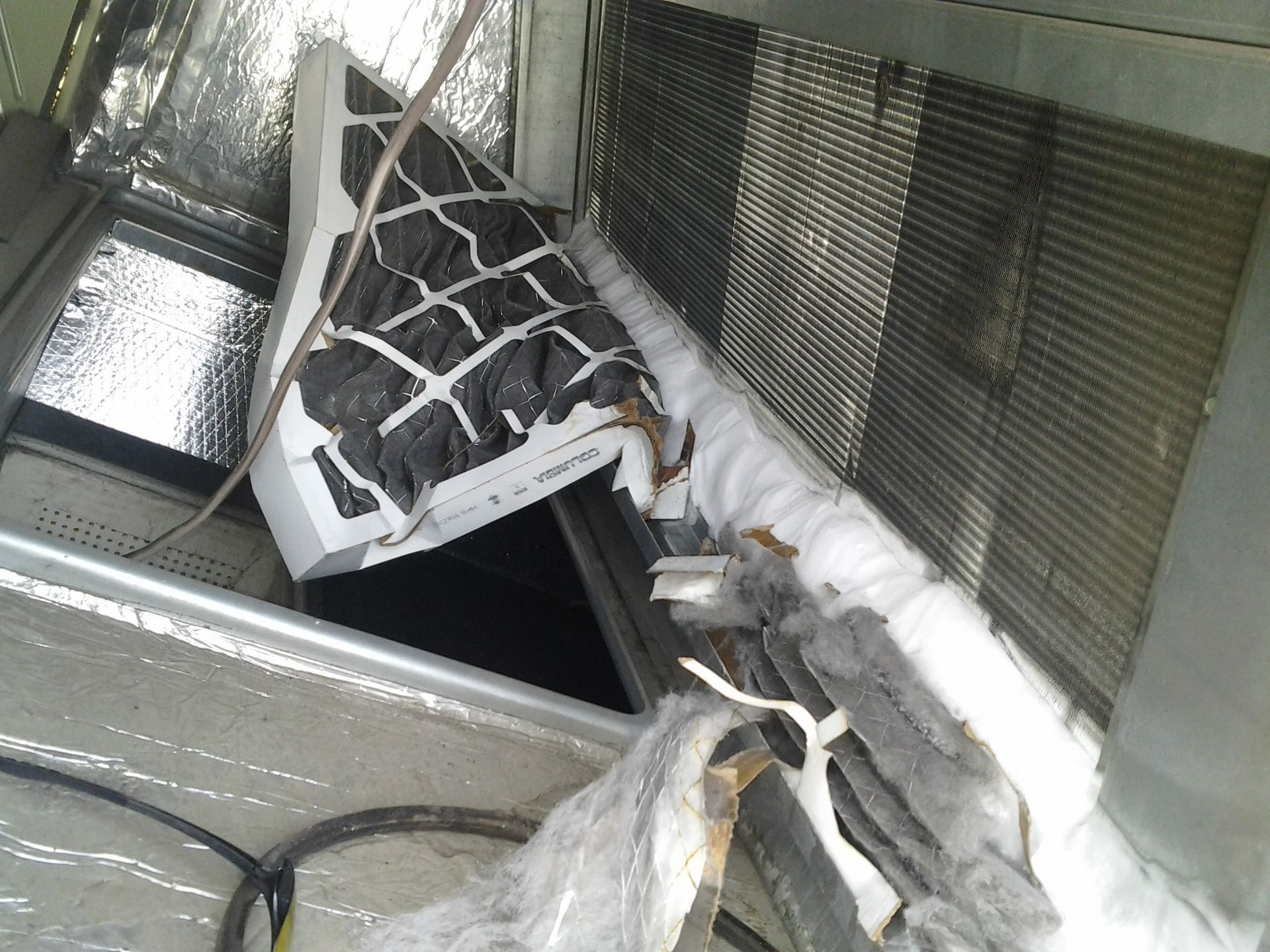Severely clogged air filter diagnosed as cause of AC airflow problem by Kings Heating