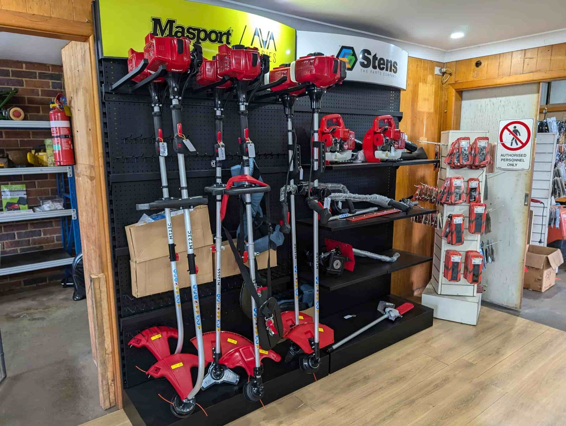 A Row Of Lawn Mower On Display In A Store — Plateau Mower Repairs In Alstonville, NSW
