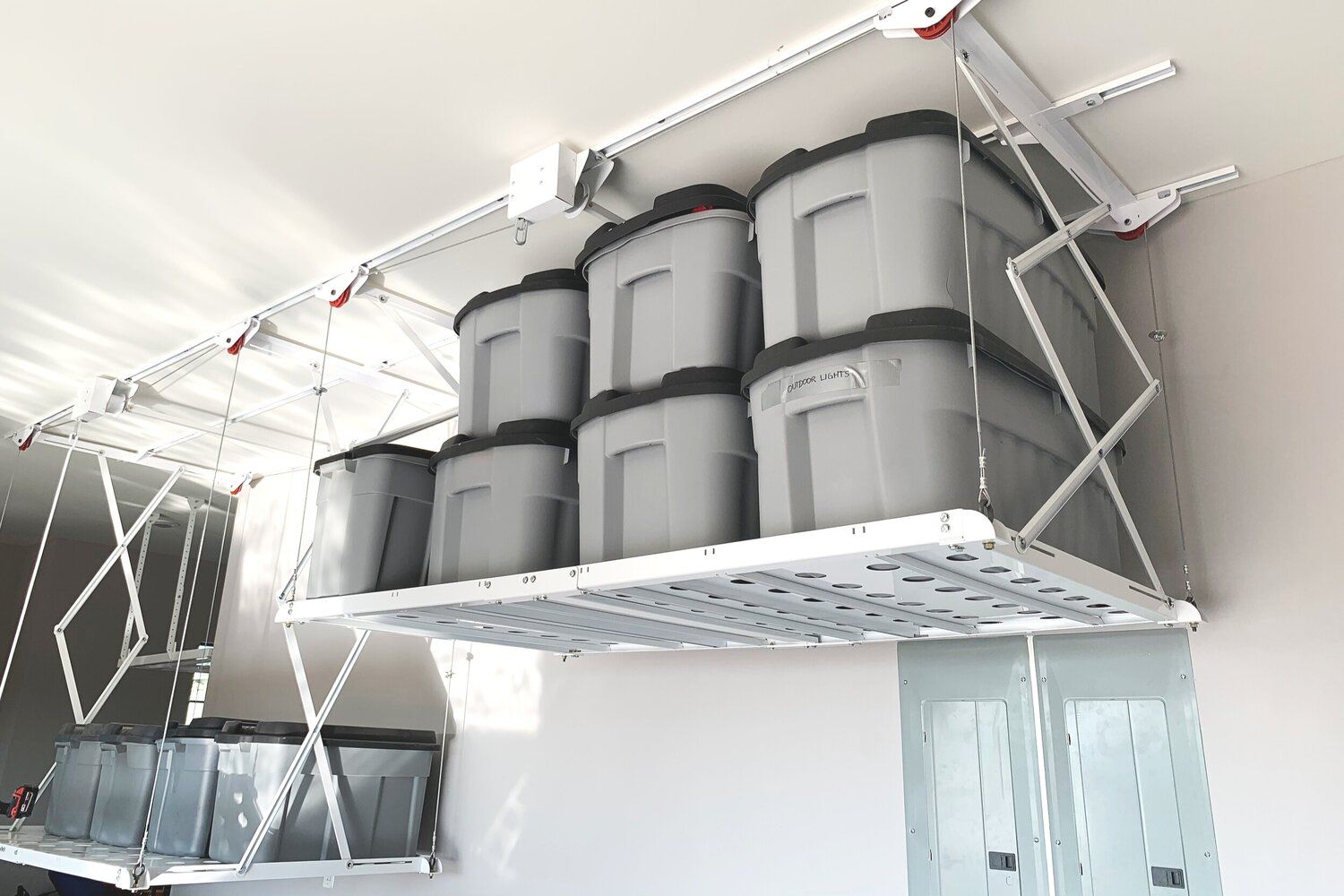 Overheard retractable garage storage solution - Syzzor Loft
