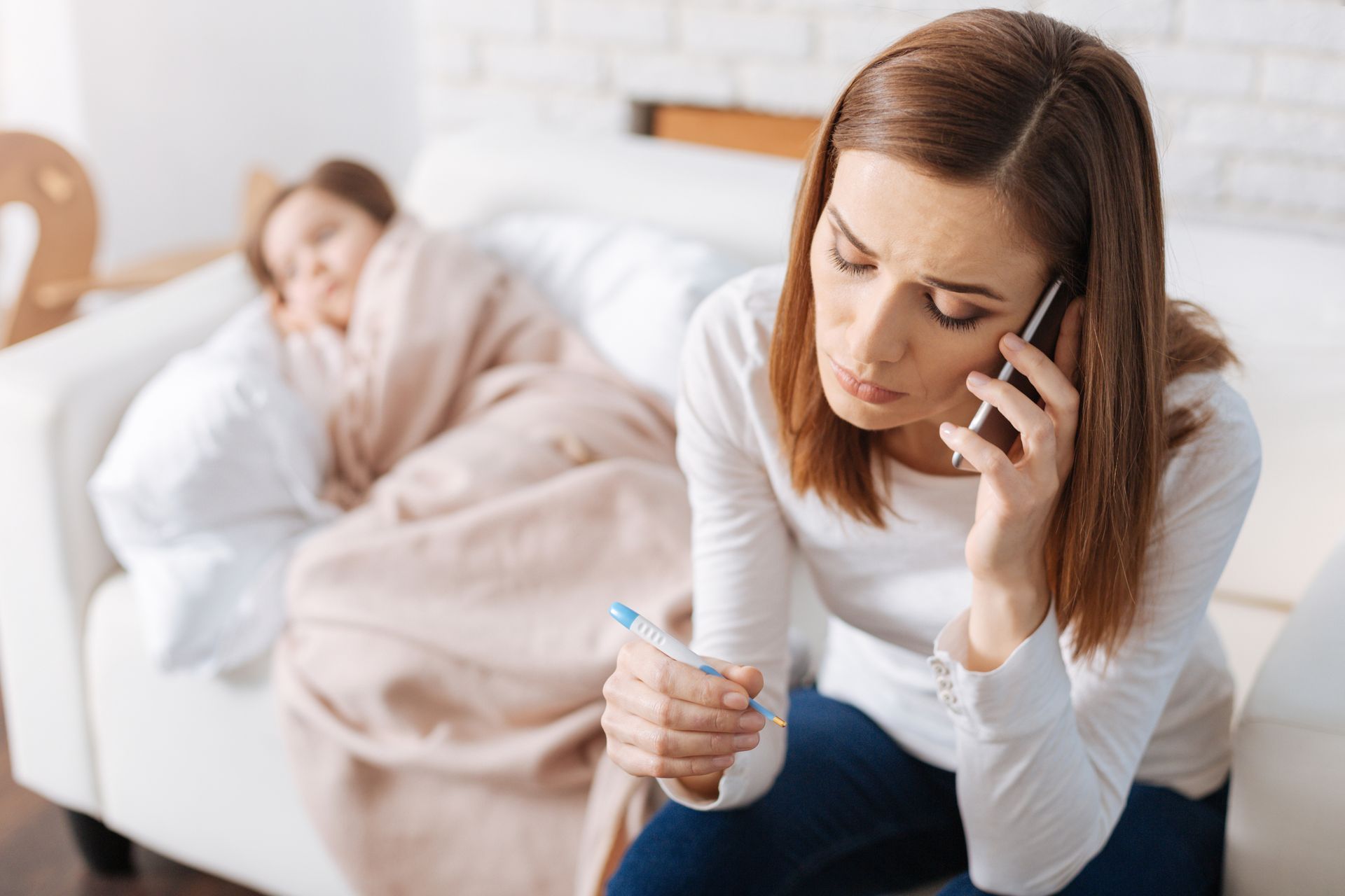 Mom with her sick child.