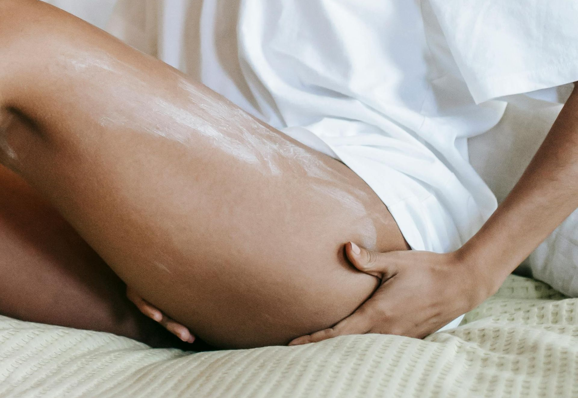 image of woman body with lotion
