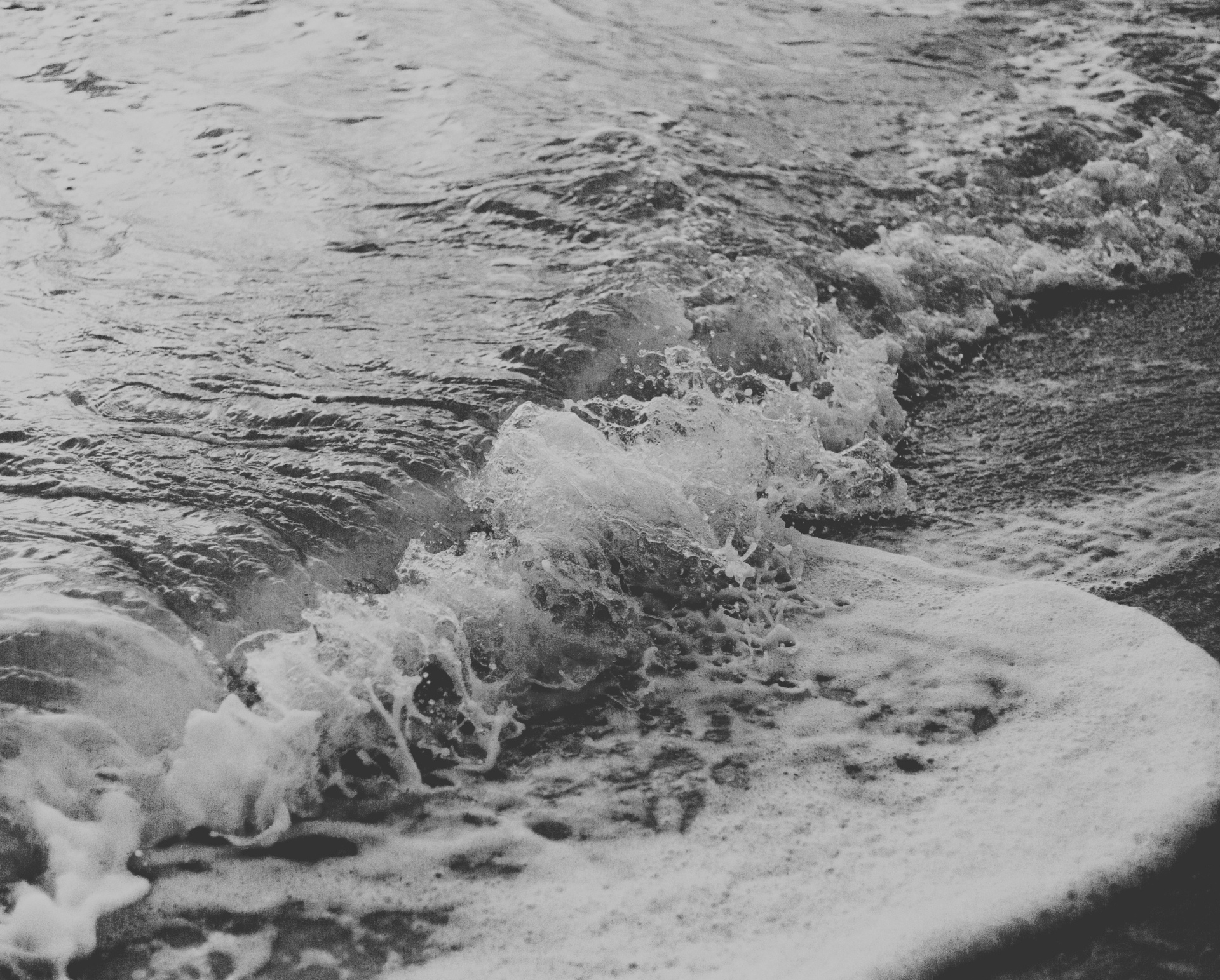 Close up image of the sea in black and white
