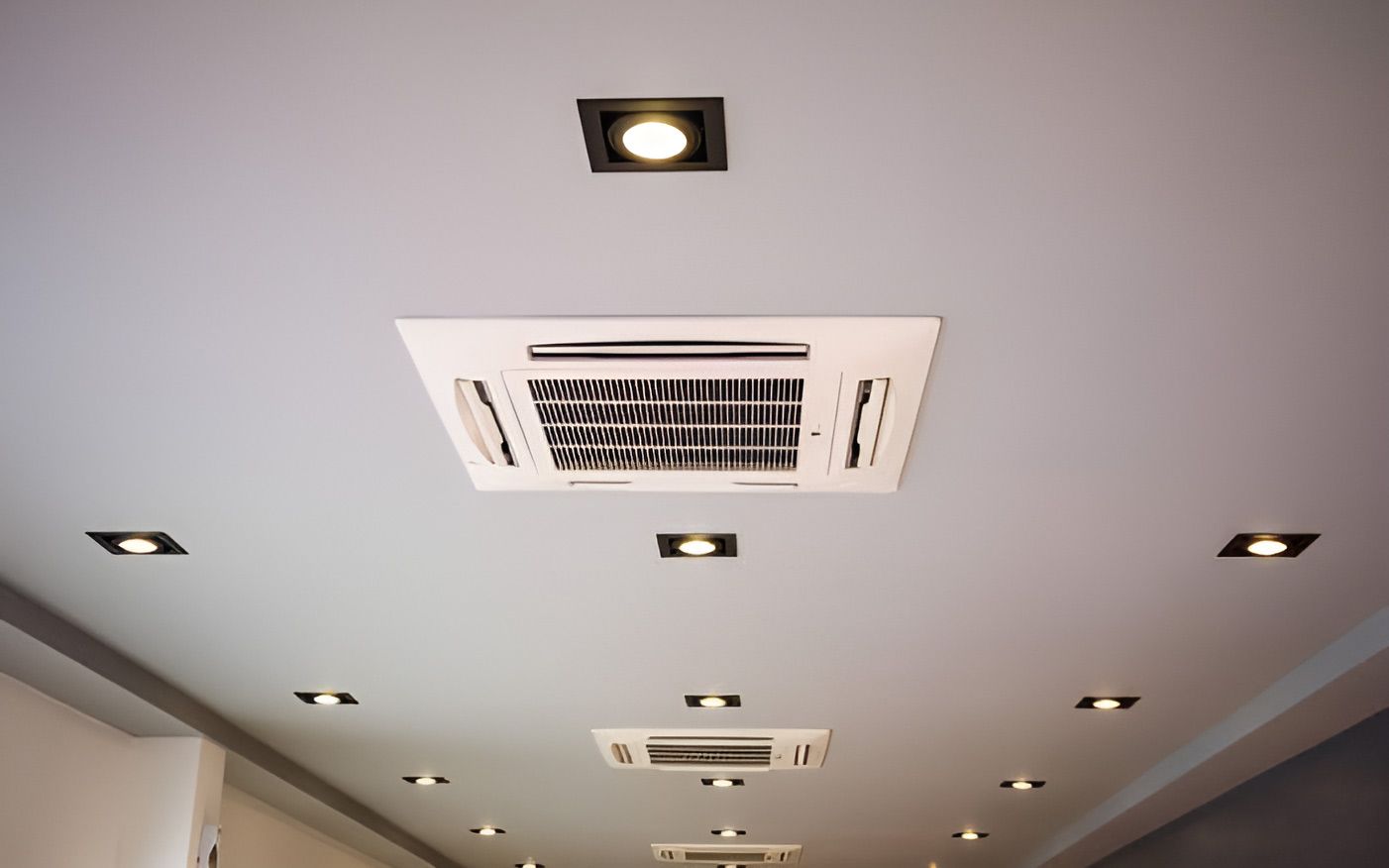 A Room With A Ceiling Fan And Lights On It — Priest Airconditioning in Ashmont, NSW