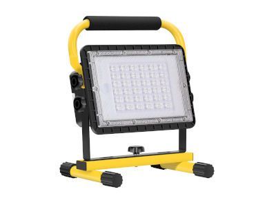 A yellow and black portable light with a handle on a stand on a white background.