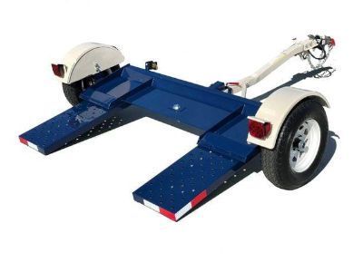 A blue and white trailer with ramps attached to it