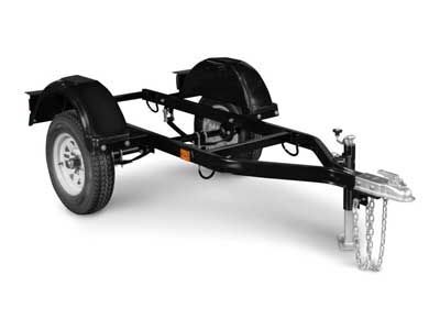 A black trailer is sitting on a white surface.