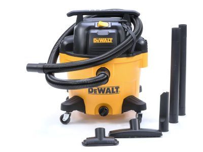 A dewalt vacuum cleaner is sitting on a white surface.