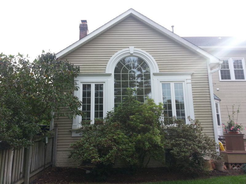 a house with a large window on the side of it