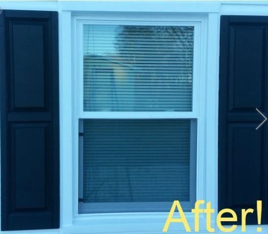 a picture of a window with black shutters and the words after