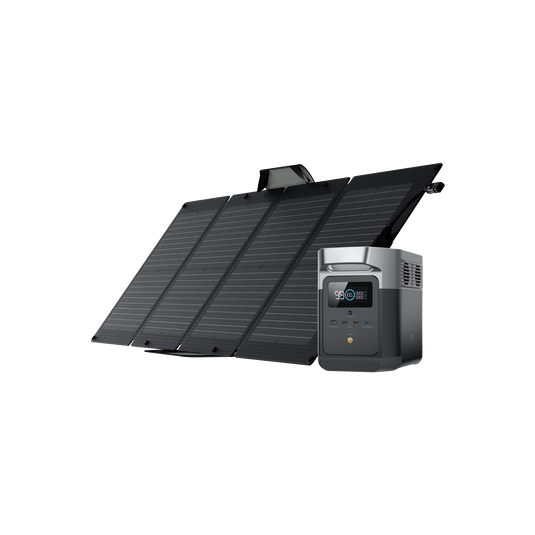Portable solar panel and power station. Black panels angled; dark gray power station with digital display.