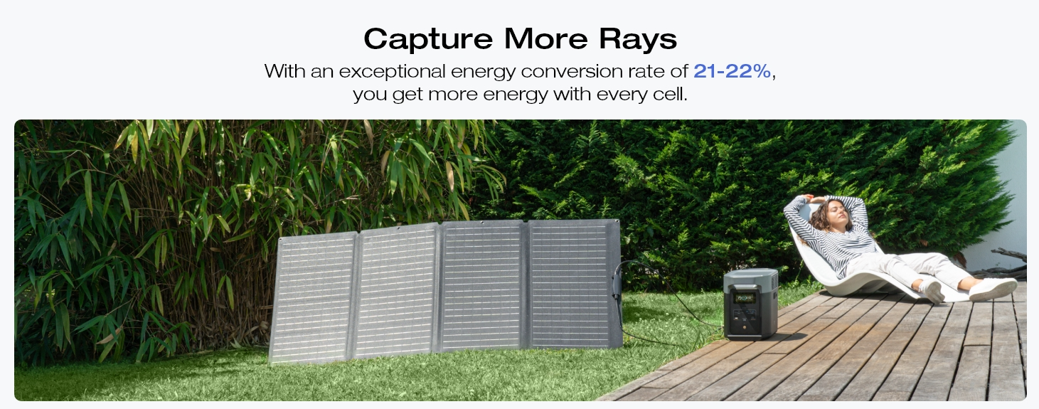 A woman relaxing on a deck, charging a power station with solar panels in a backyard.