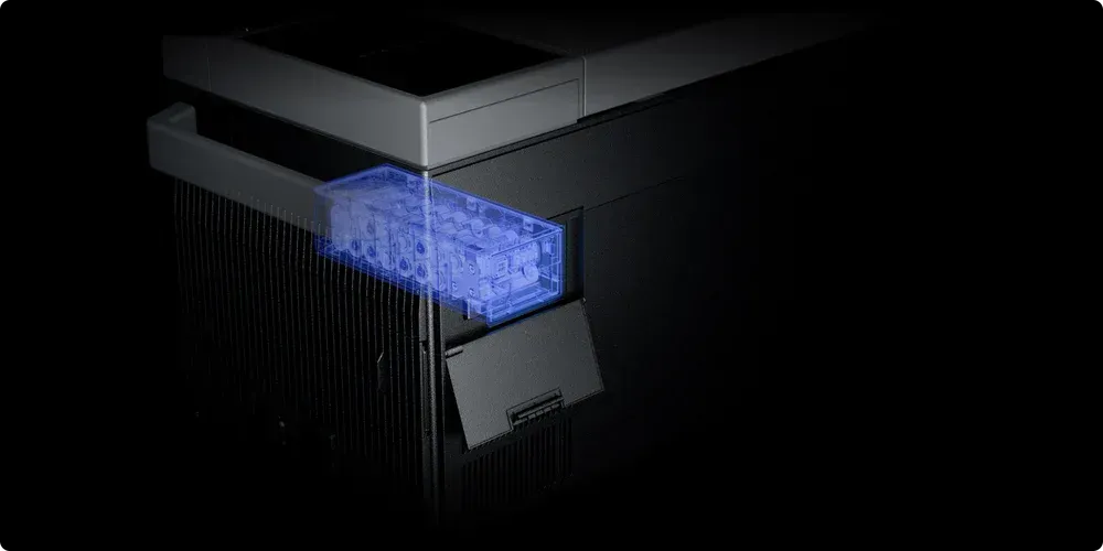 Black computer case with a blue-glowing section.