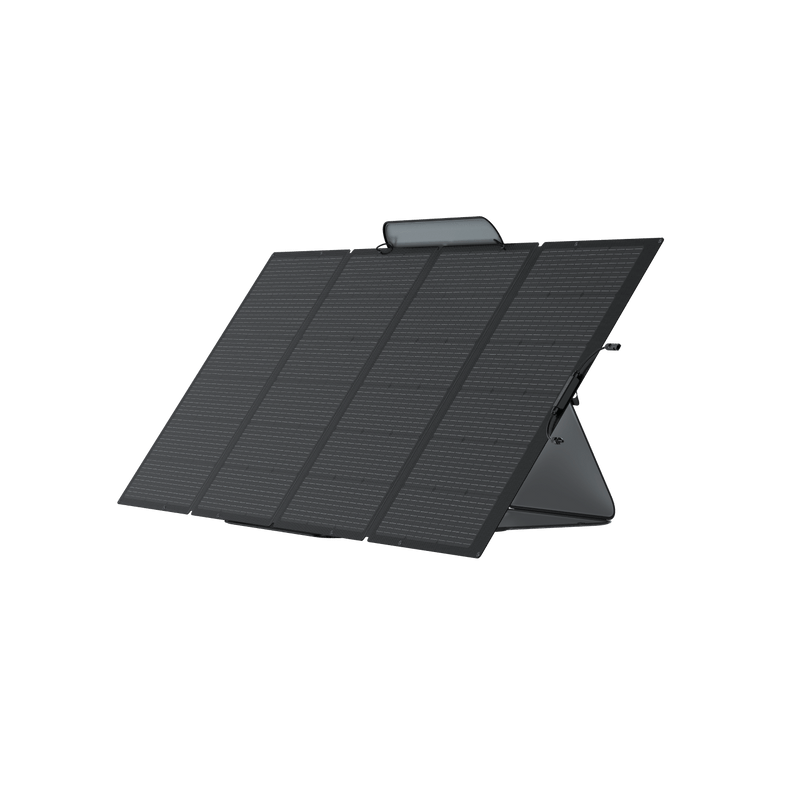 Black foldable solar panel set up at an angle.