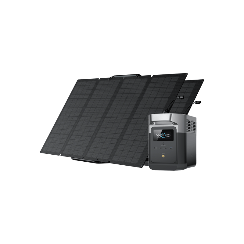 Black solar panels angled up beside a black and gray power station.