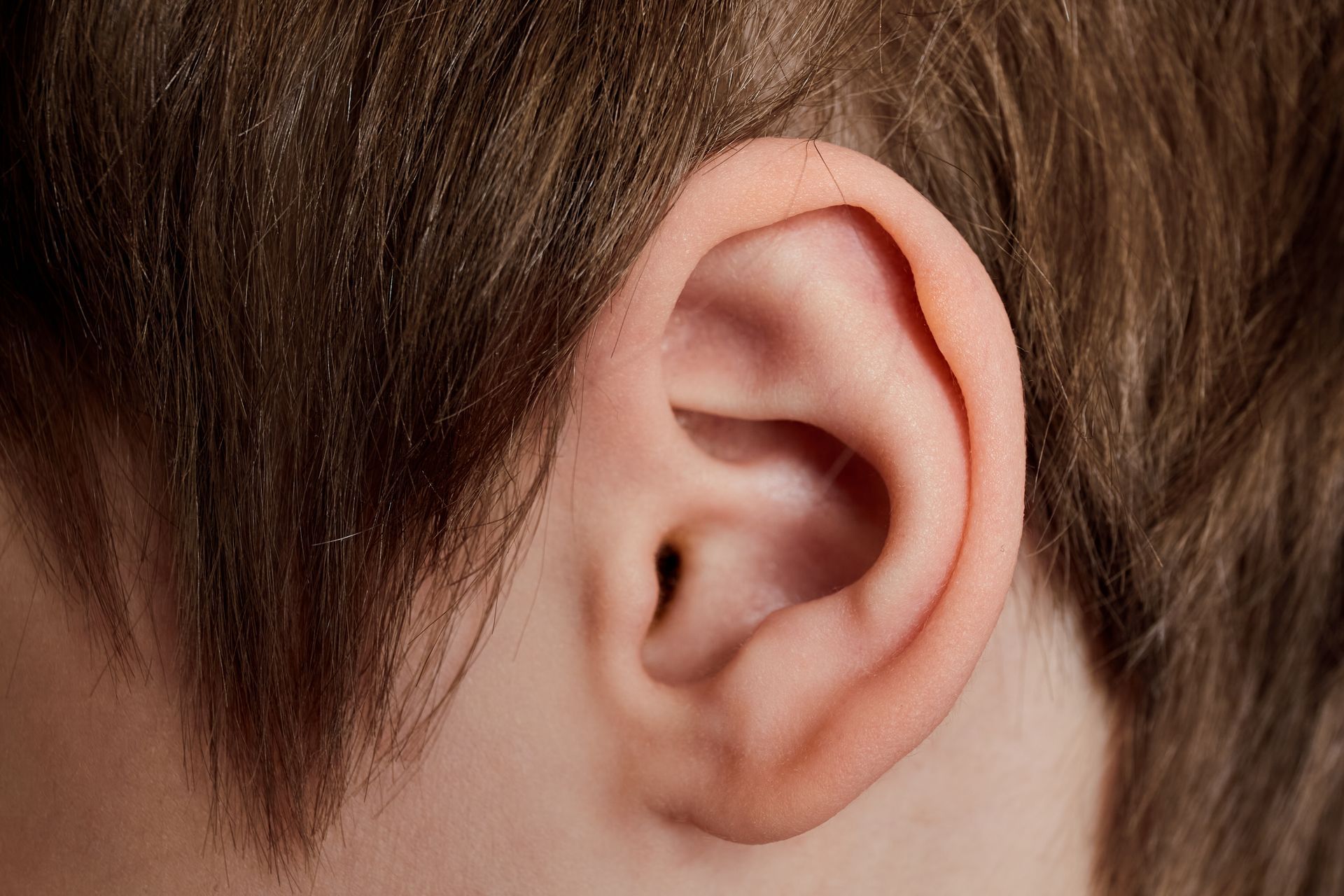 Concept of medical exam and treatment by an otolaryngologist. Proper care and cleaning of ears. Concept of medical exam and treatment by an otolaryngologist. Proper care and cleaning of ears.