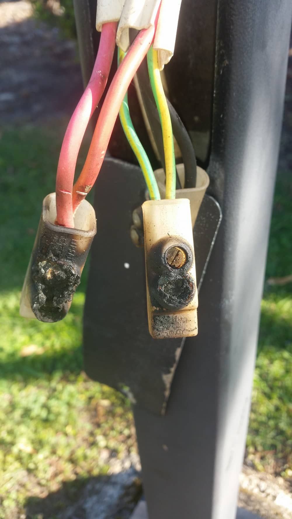 A Close Up of a Bunch of Wires Connected to a Pole — D.J. Whatley & Son Pty Ltd in Beenleigh, QLD