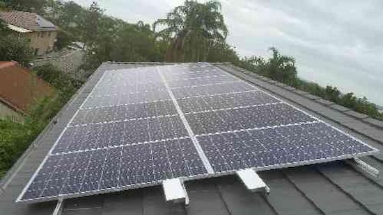A Roof With a Lot of Solar Panels on It — D.J. Whatley & Son Pty Ltd in Beenleigh, QLD
