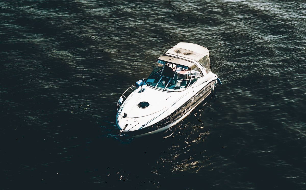 A Speeding Boat on the Lake of the Ozarks in Missouri. File a Boat Accident Injury Claim With Us.