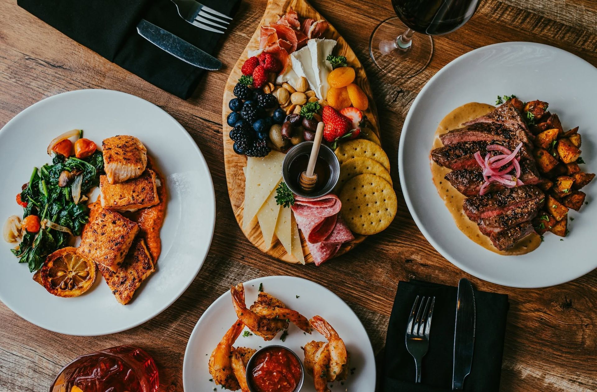 Goodies On Commerce in Gainesville, Texas near River of Love Cabins serving casual fine dining, handcrafted breakfast, lunch, dinner, gourmet coffee, and charcuterie boards.