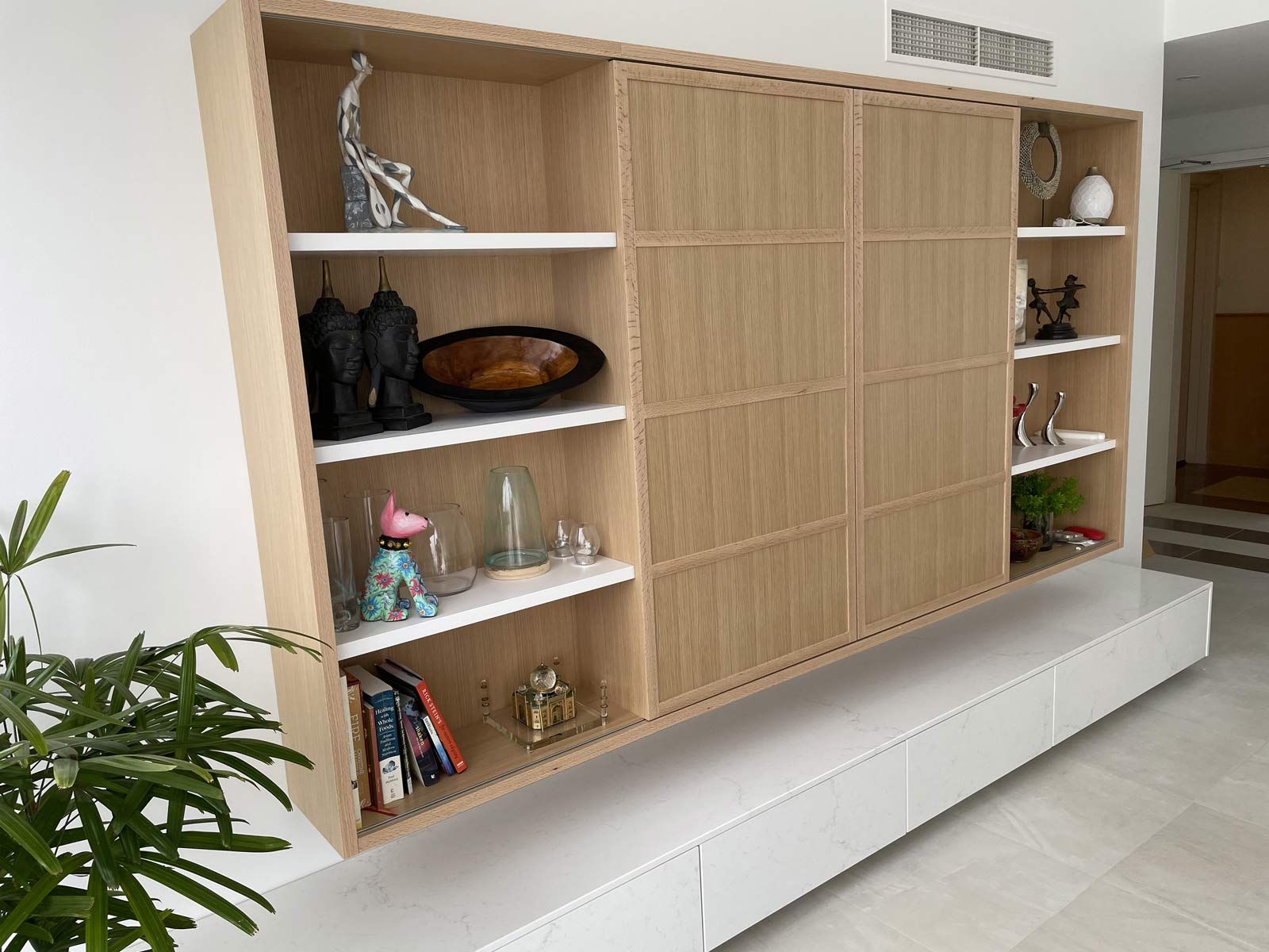 Built-in Wooden Shelving Unit With Sliding Doors — Norrland in Warners Bay, NSW