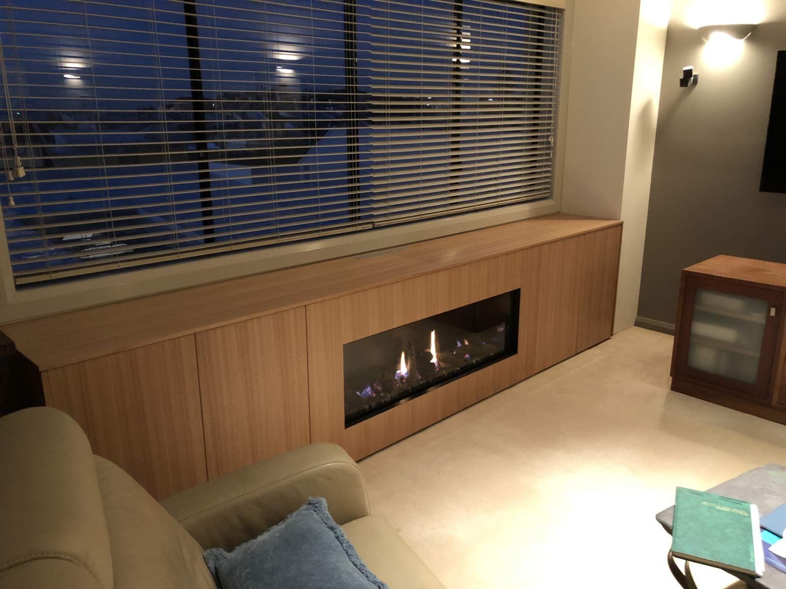 Wooden Cabinet With Fireplace, Built-in Under a Window With Blinds — Norrland in Warners Bay, NSW