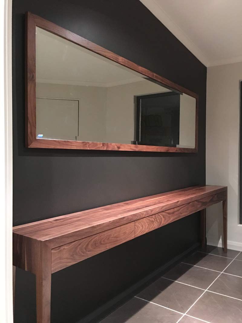 Long Wooden Console Table and Rectangular Mirror on Dark Wall — Norrland in Warners Bay, NSW
