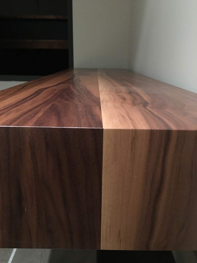 Close-up of a Wooden Table Surface With Two Halves of Differing Colour Hues — Norrland in Warners Bay, NSW
