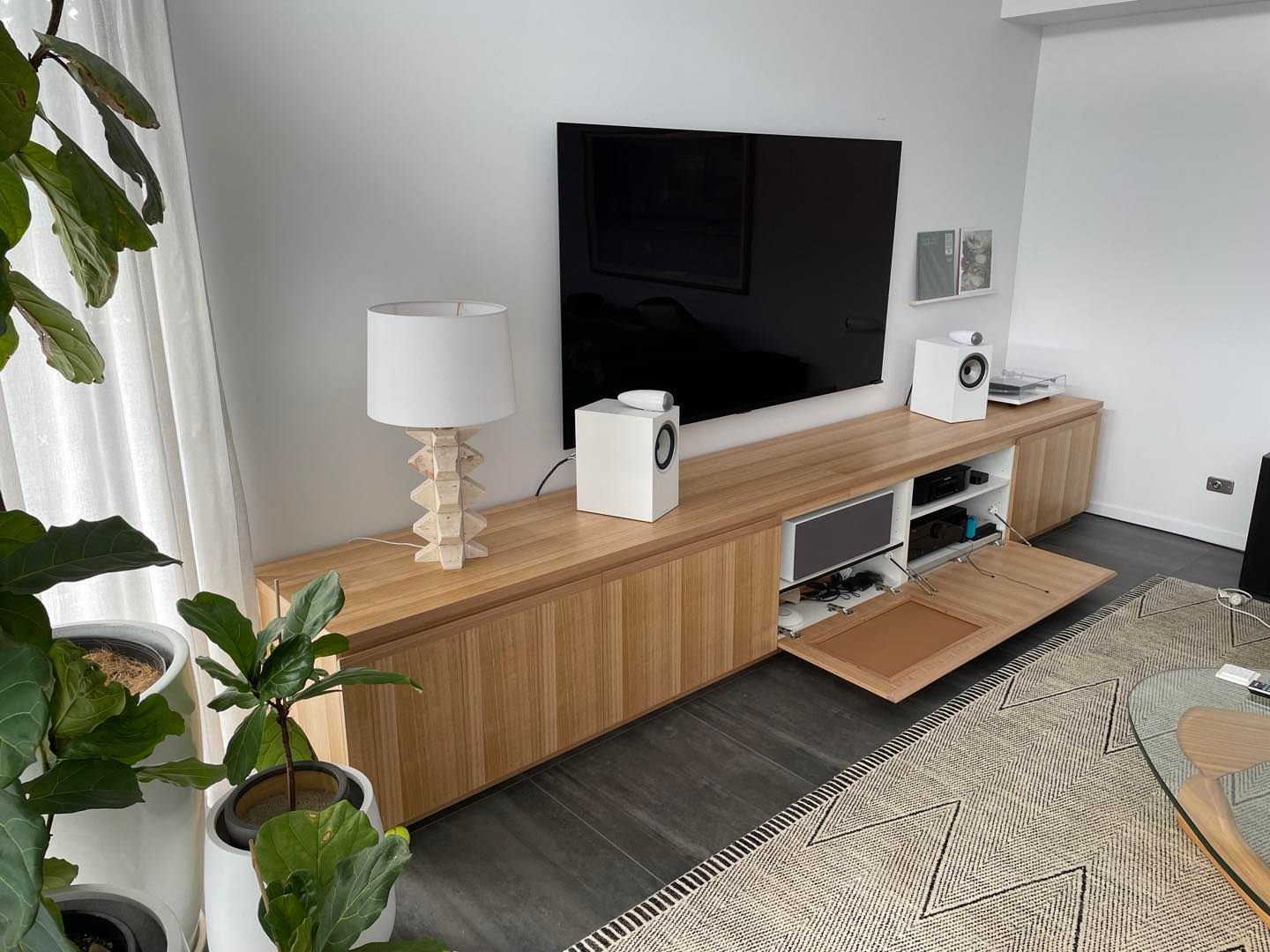 Wooden Console Table With Two Drawers Against a Beige Wall and Carpet — Norrland in Warners Bay, NSW