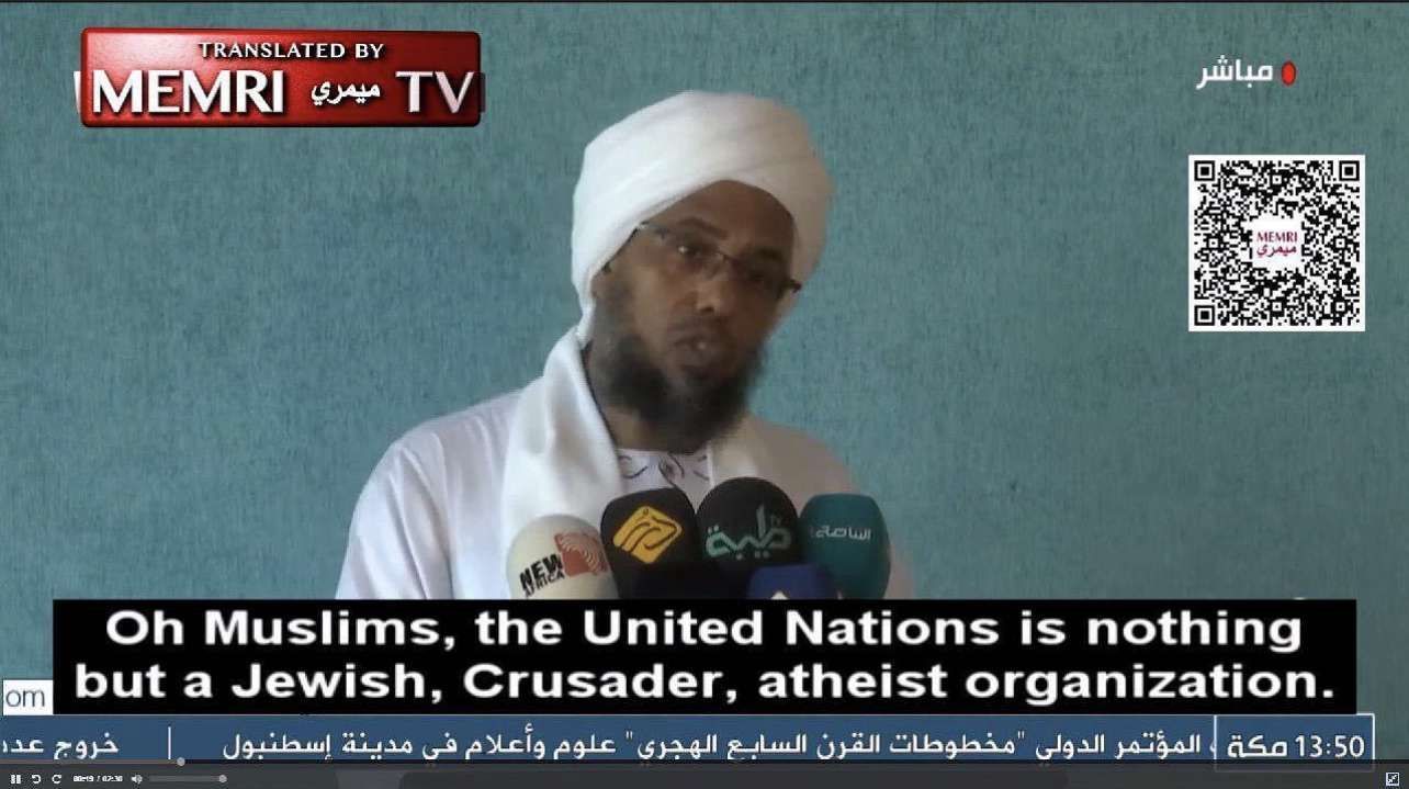 A man in a white turban is talking on a tv screen that says memri tv