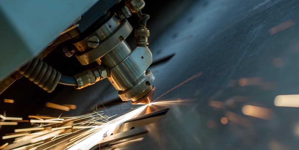 Metal cutting by laser