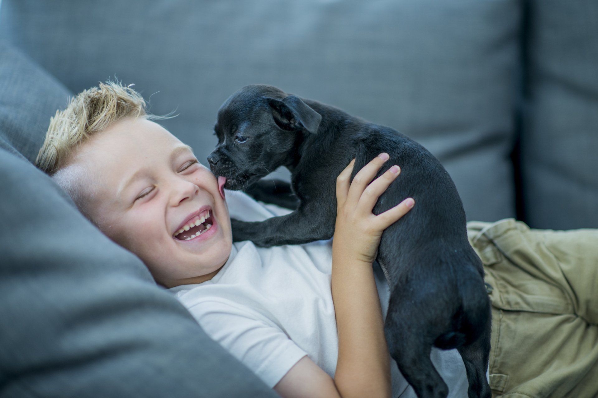 kid with puppy