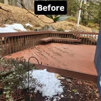 Snow-covered wooden deck with railing and steps in a wooded yard, labeled “Before”
