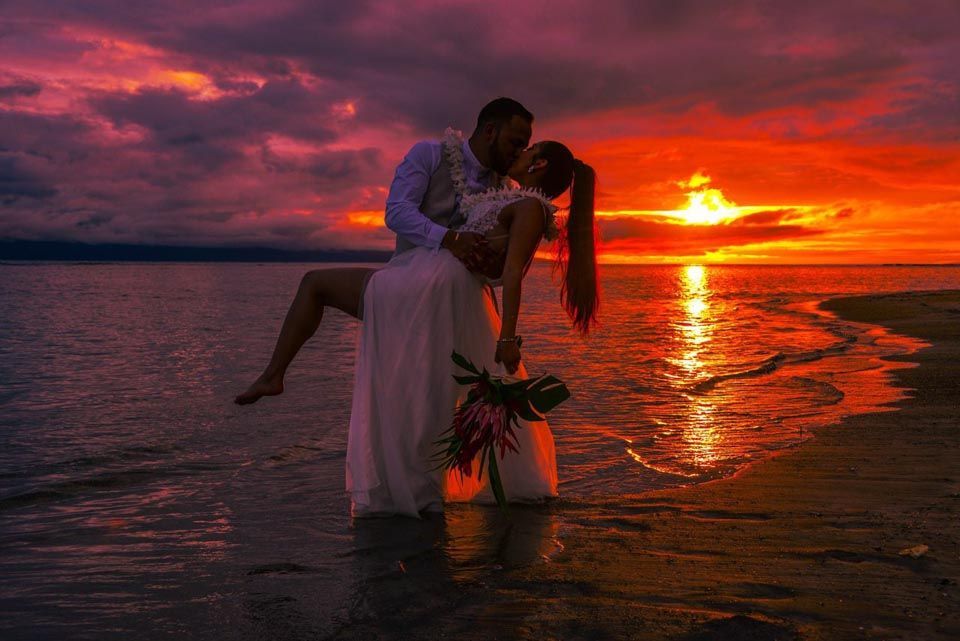 couple on beach at sunset