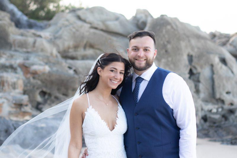 couple in front of rocks