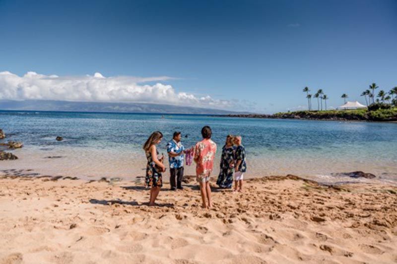 4 people on beach