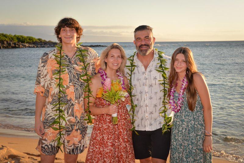 four people on beach