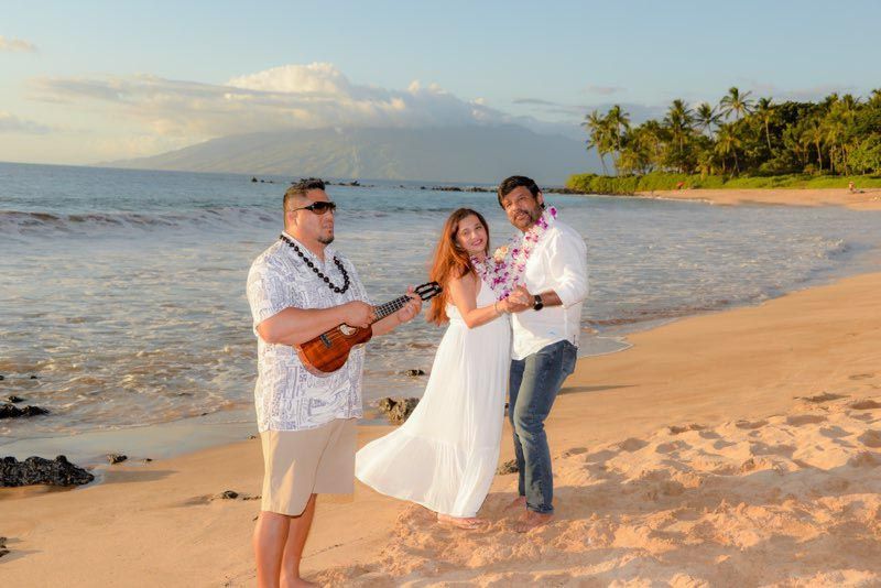 three people on beach
