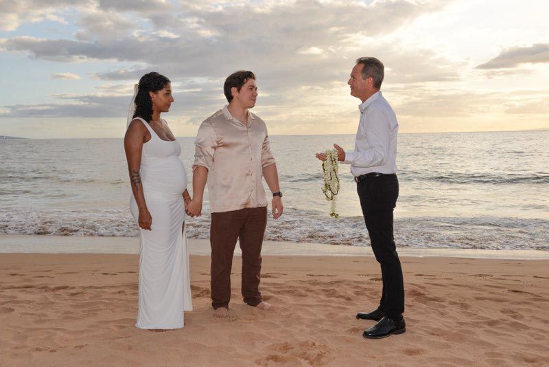 three people on beach