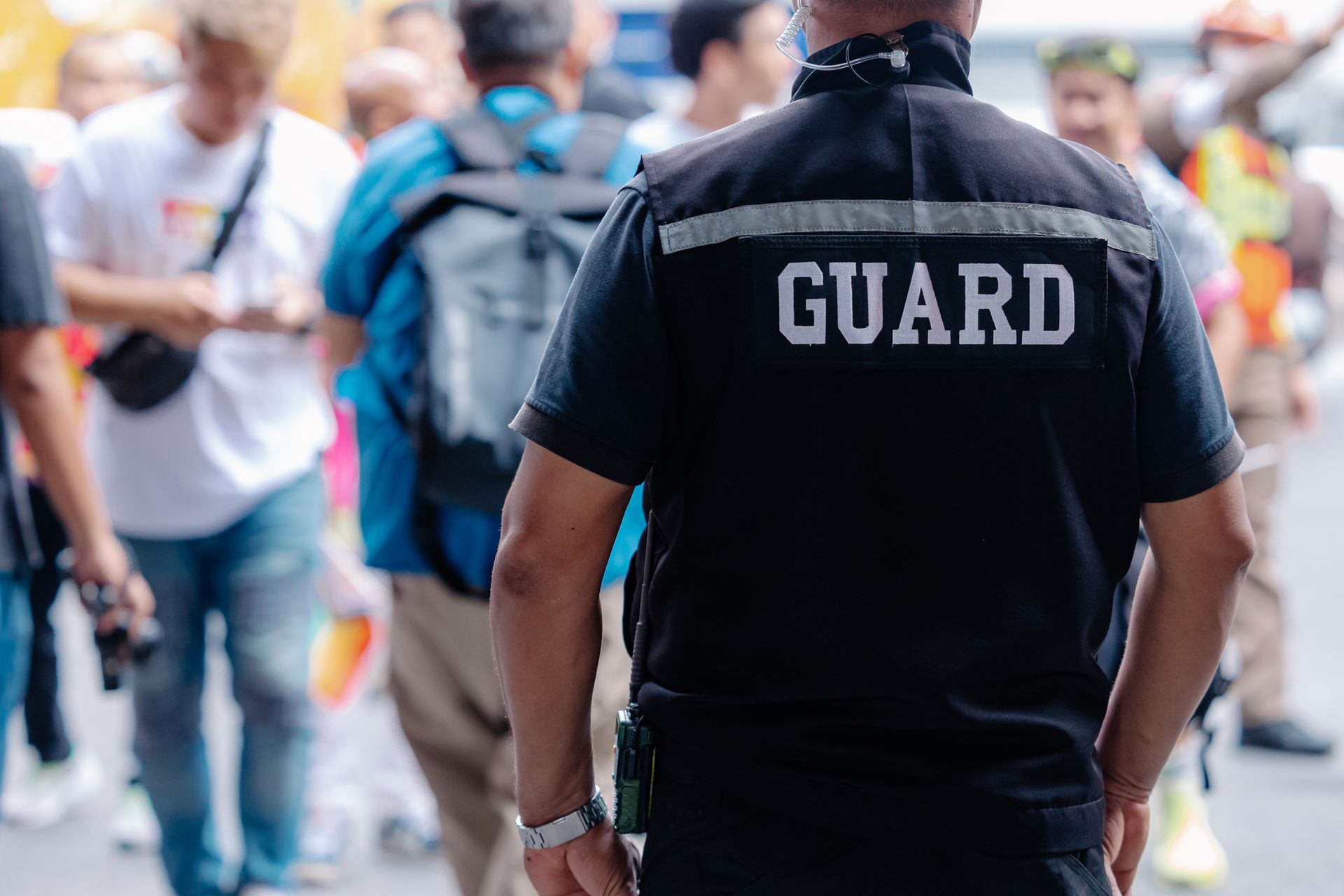 Guard in black vest with 
