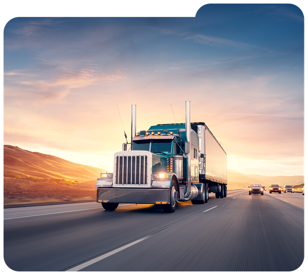 Semi truck driving on a highway at sunset with cars in the distance