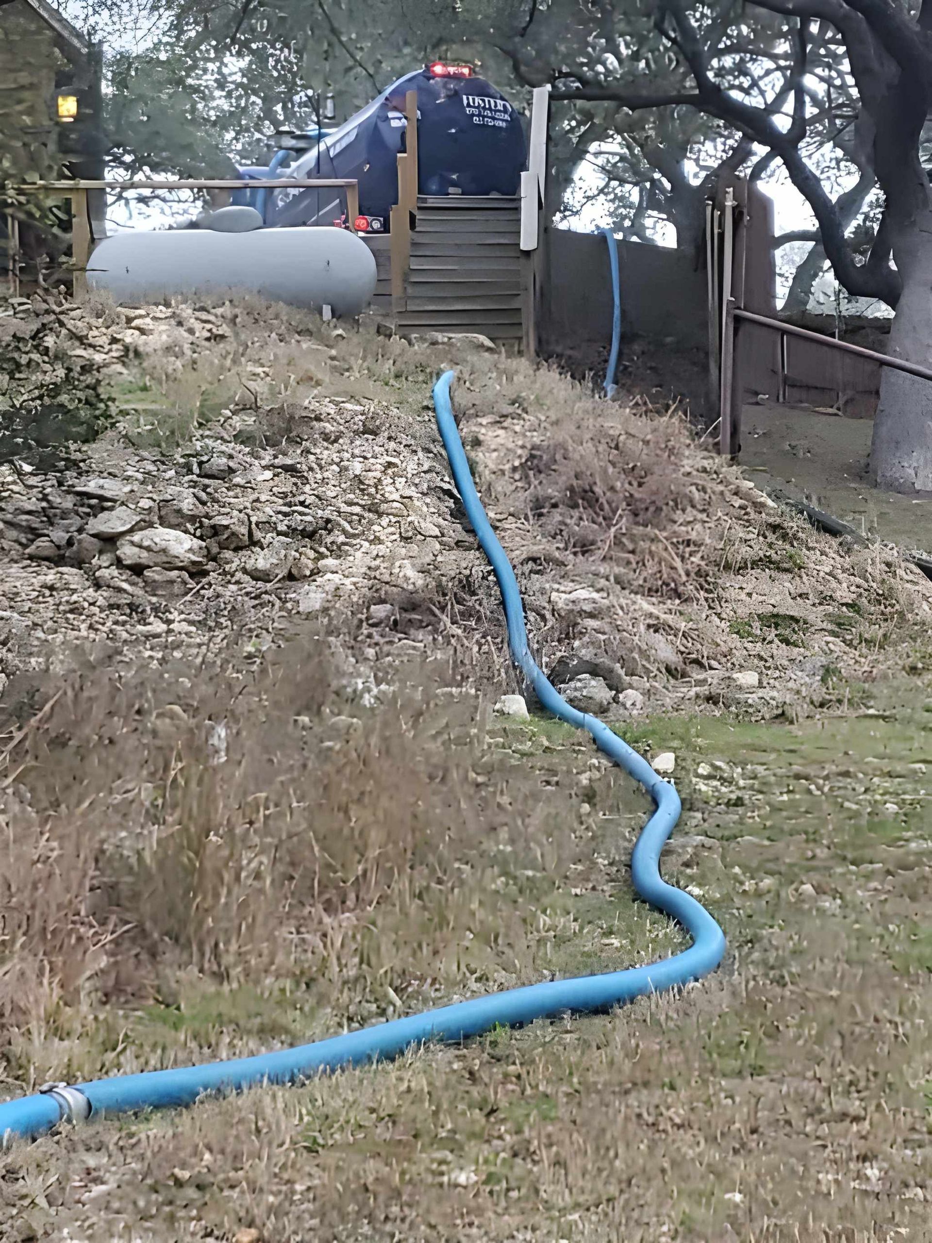 Septic technician inspecting a residential system