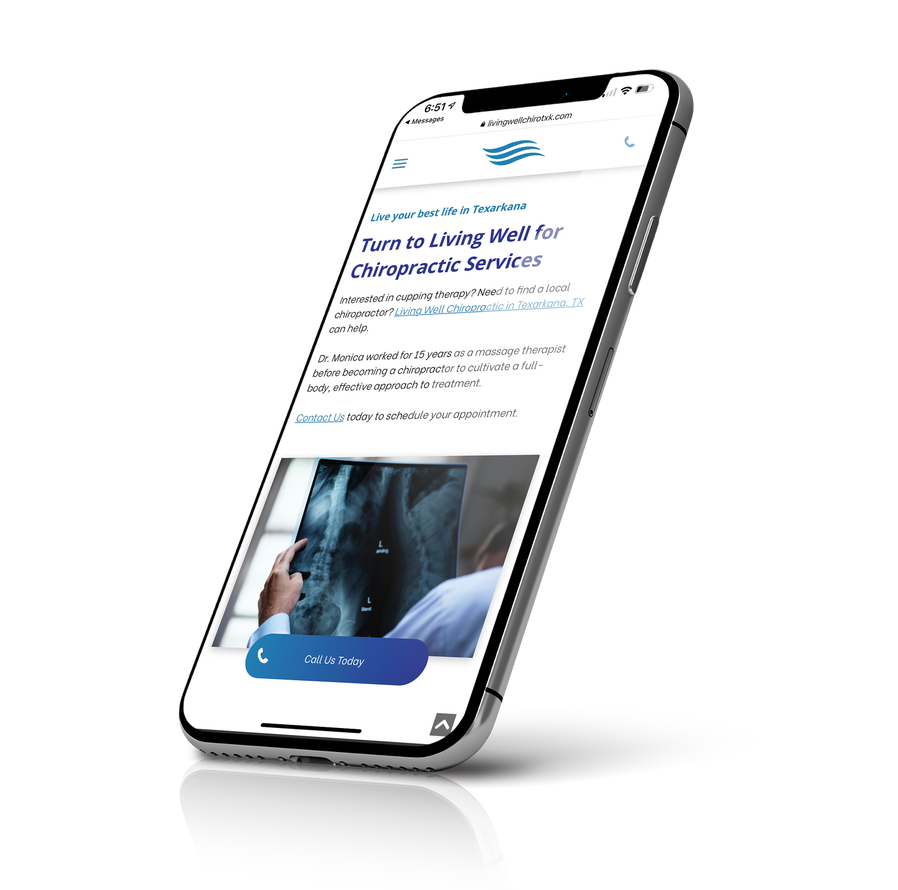 A cell phone is displaying a website for a chiropractic service.