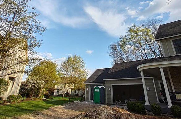 Tree Surrounding  A House — Middletown, OH — B & G Tree Service