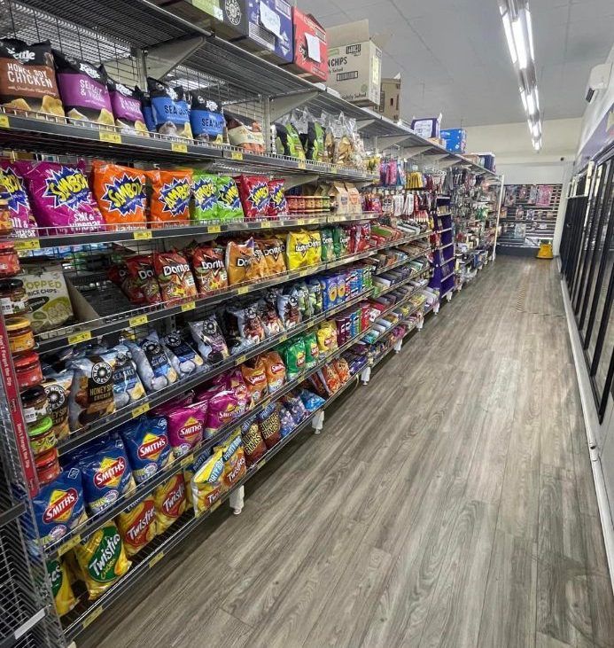 A Variety Of Salads Are On A Shelf In A Grocery Store — Smith Street Supermarket In Darwin City, Nt 