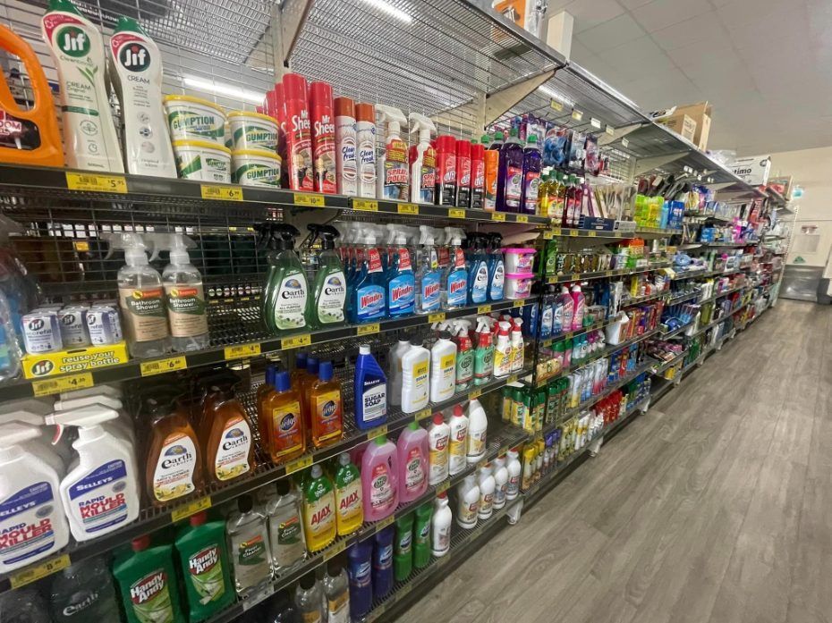 A grocery store aisle filled with lots of cleaning products. — Smith Street Supermarket In Darwin City, NT