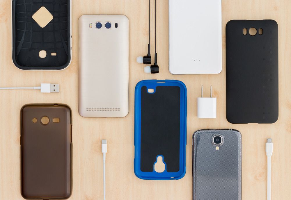 There Are Many Different Types Of Phones And Accessories On The Table — Smith Street Supermarket In Darwin City, NT
